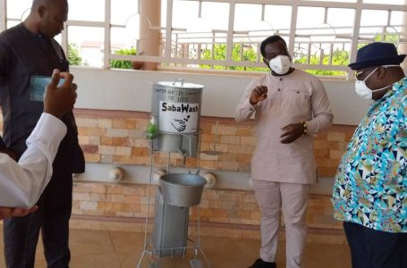 Dr. Courage Saba makes a donation to the University for Development Studies